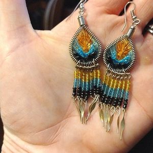 Set of yellow, blue, and black dangle earrings